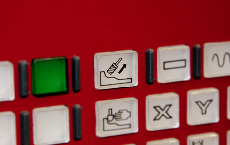 Pushbutton to move the tool away from the part